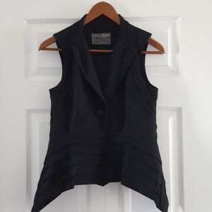 Asymmetrical vest